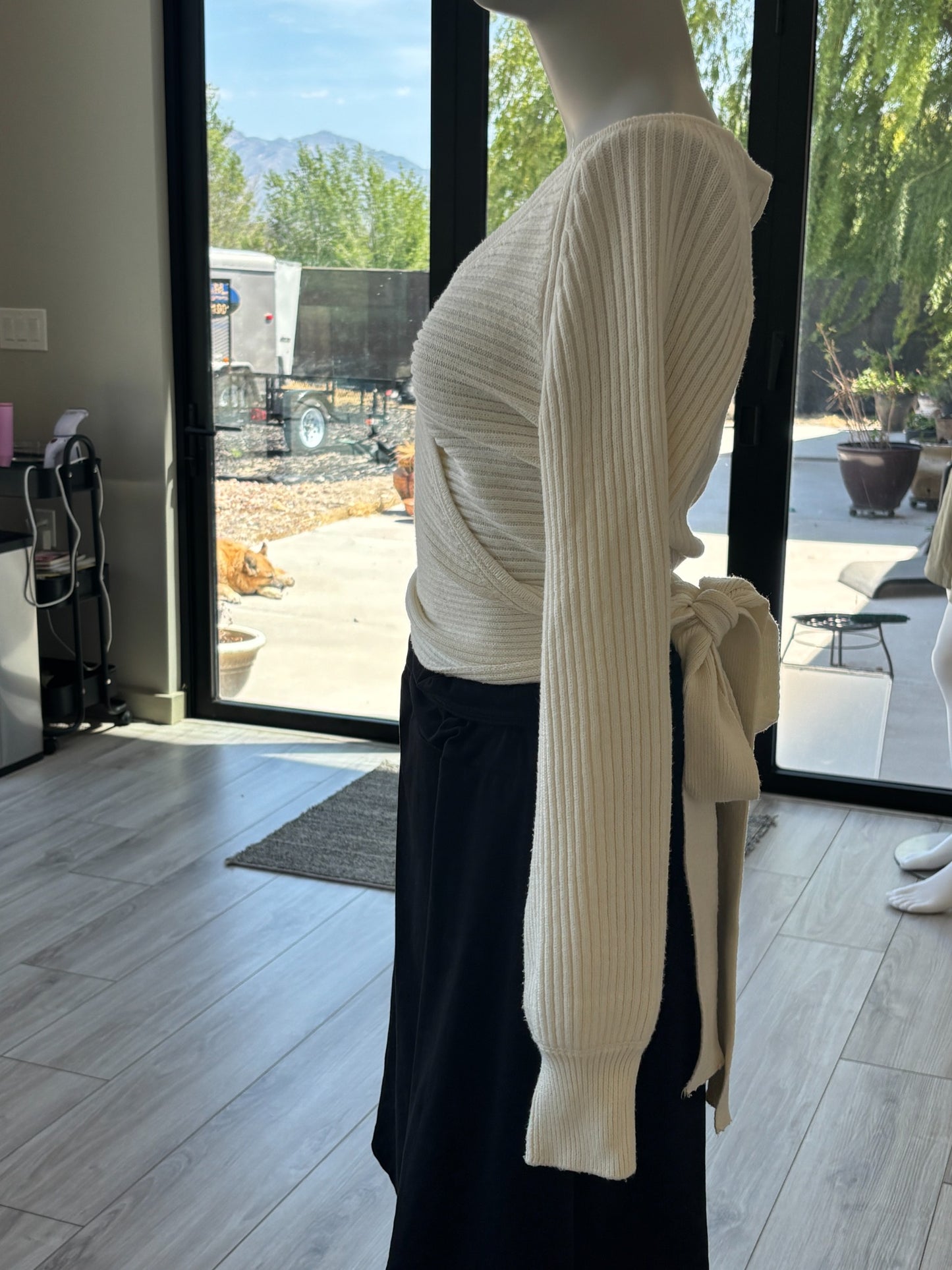 Vici tie back wrap sweater styled with elegant feminine detail