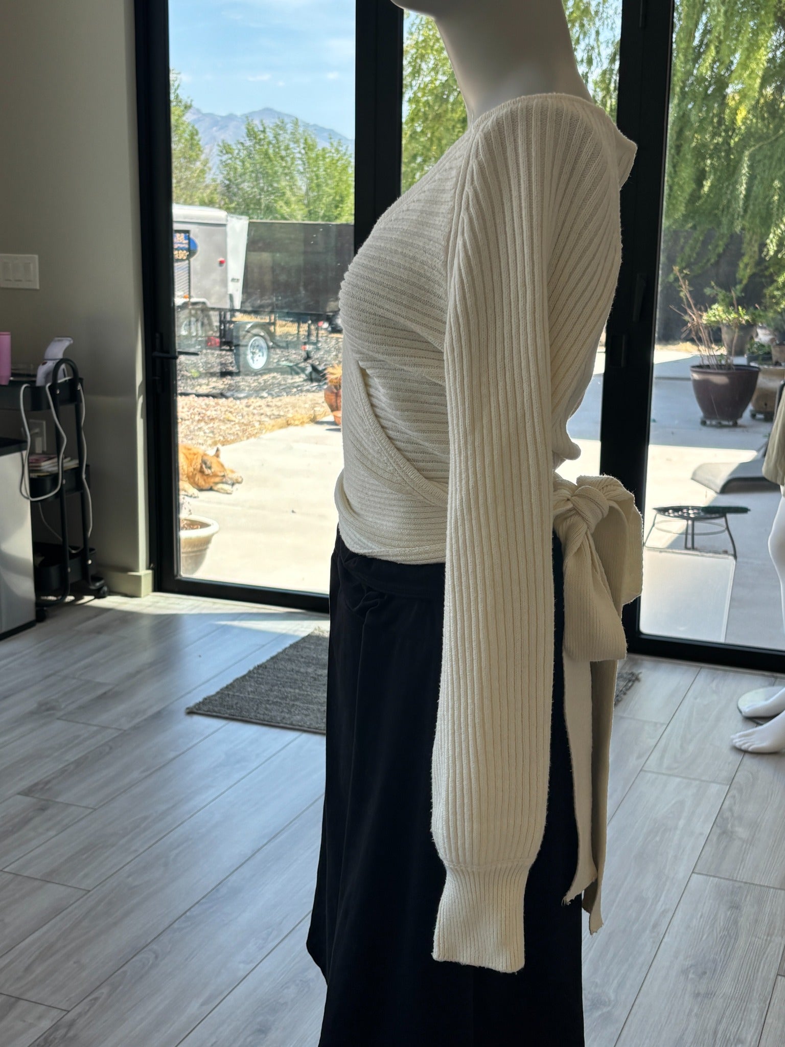 Vici tie back wrap sweater styled with elegant feminine detail