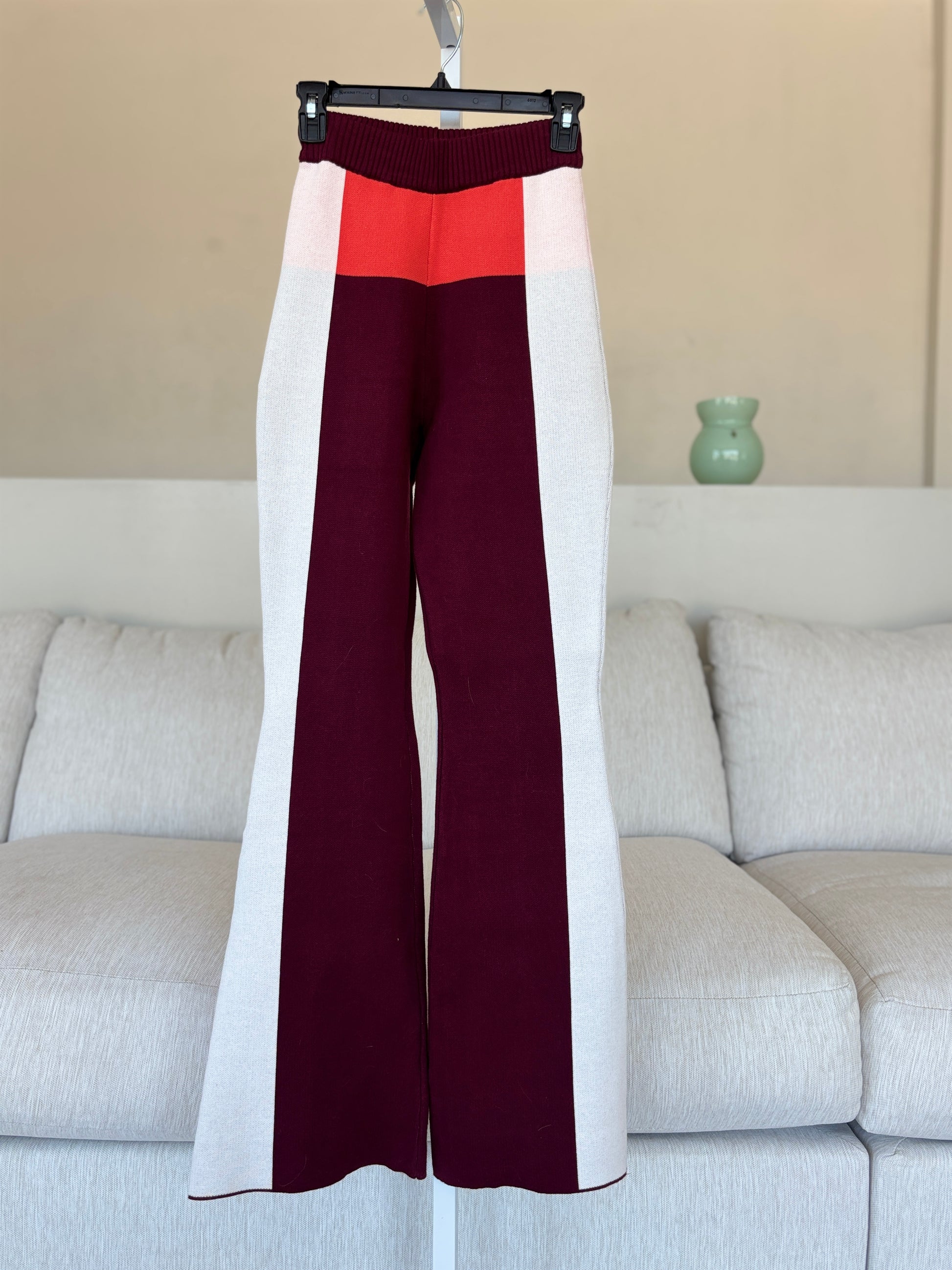 YLLW Ryder high-rise cotton-knit pants with a wide ribbed elastic waistband and graphic colorblock design