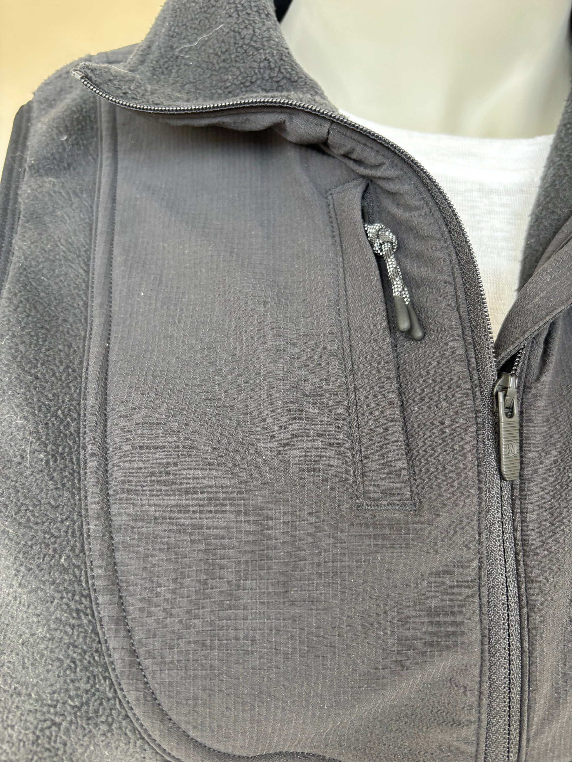 elevated secondhand lululemon black fleece vest Adored Again boutique cozy minimalist style