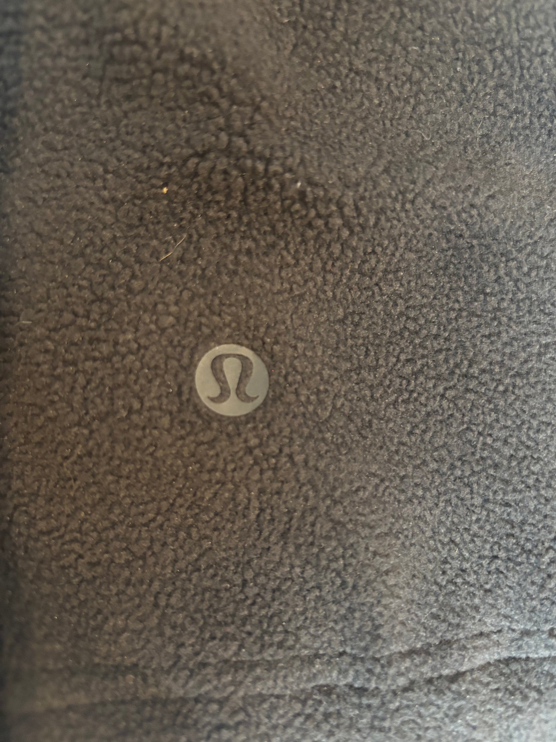 lululemon logo on black fleece ever so soft vest for cooler weather.